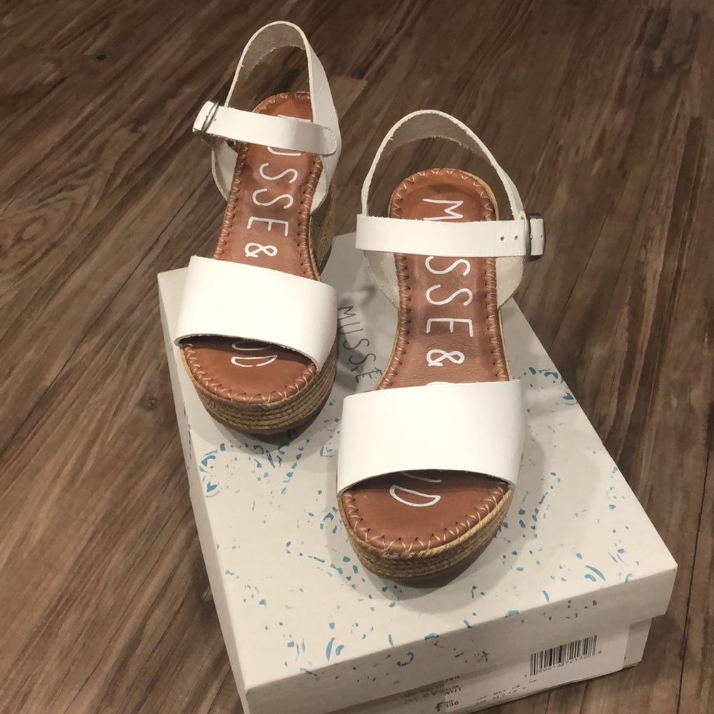 Beautiful white leather Musse and Cloud Wedges.